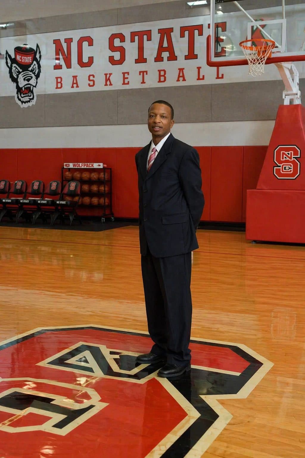 Coach Kenya Davis on the NC State basketball court