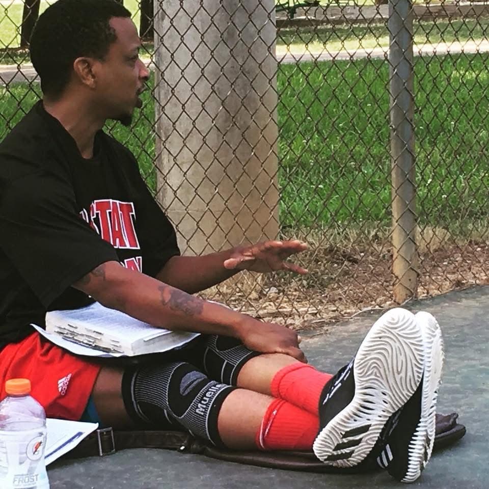 Coach Kenya Davis leading an athlete development discussion